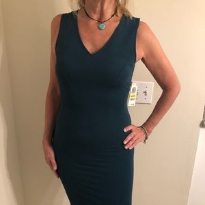 Jewel tone green fitted sheath dress